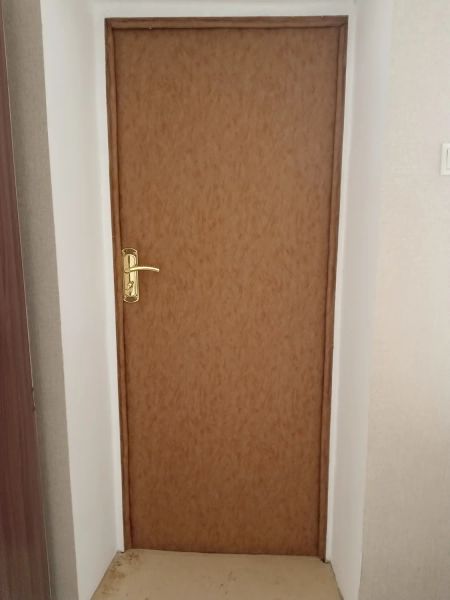 Обивка двери деревянной