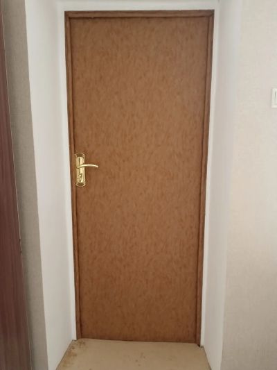 Обивка двери деревянной