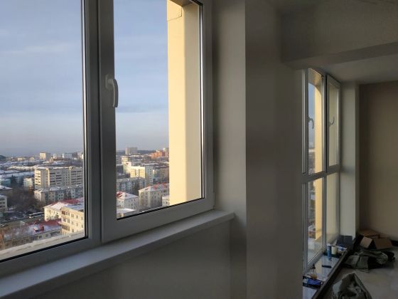 Изготовление и монтаж балконной панорамной конструкции ПВХ.
