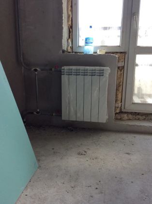 Установка радиатора отопления 
