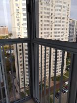 Окно балконное панорамное с решеткой после отмывки