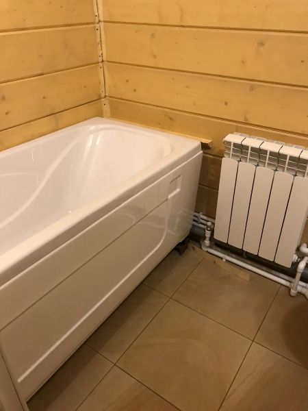 Монтаж радиатора отопления в ванной комнате 