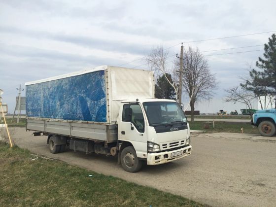 Фото  грузовика, погрузка верхняя,задняя,боковая, грузоподъемность 5 тн, объем 35 м3