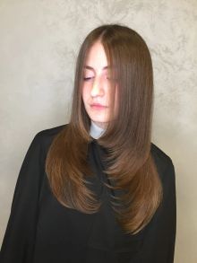 Стрижка на длинные волосы 