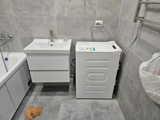 Установка стиральной машины .